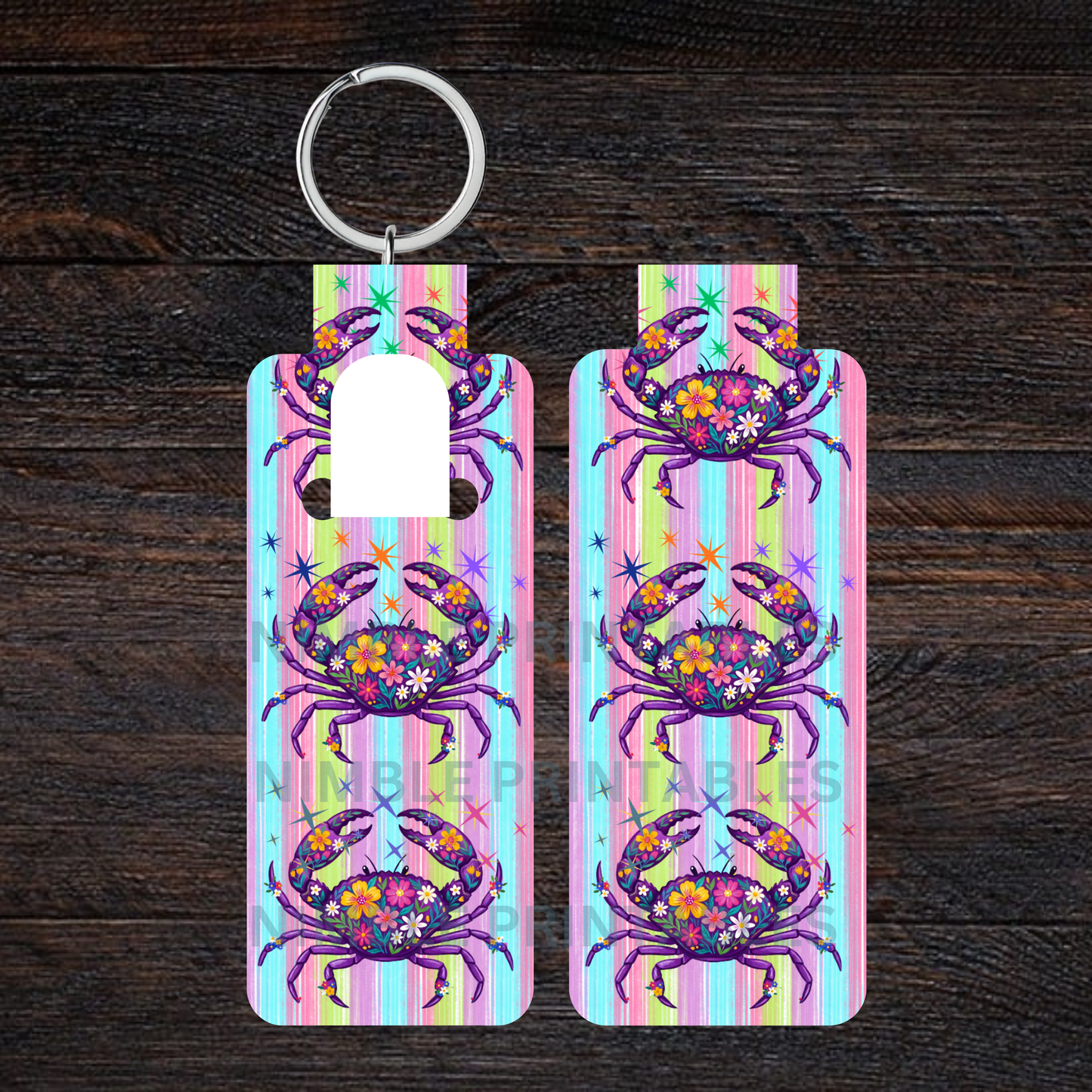 Two colorful hand sanitizer keychains with a floral crab design.