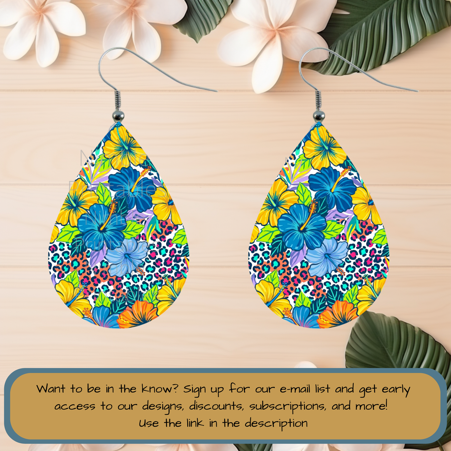 Teardrop earrings with floral and leopard print patterns.