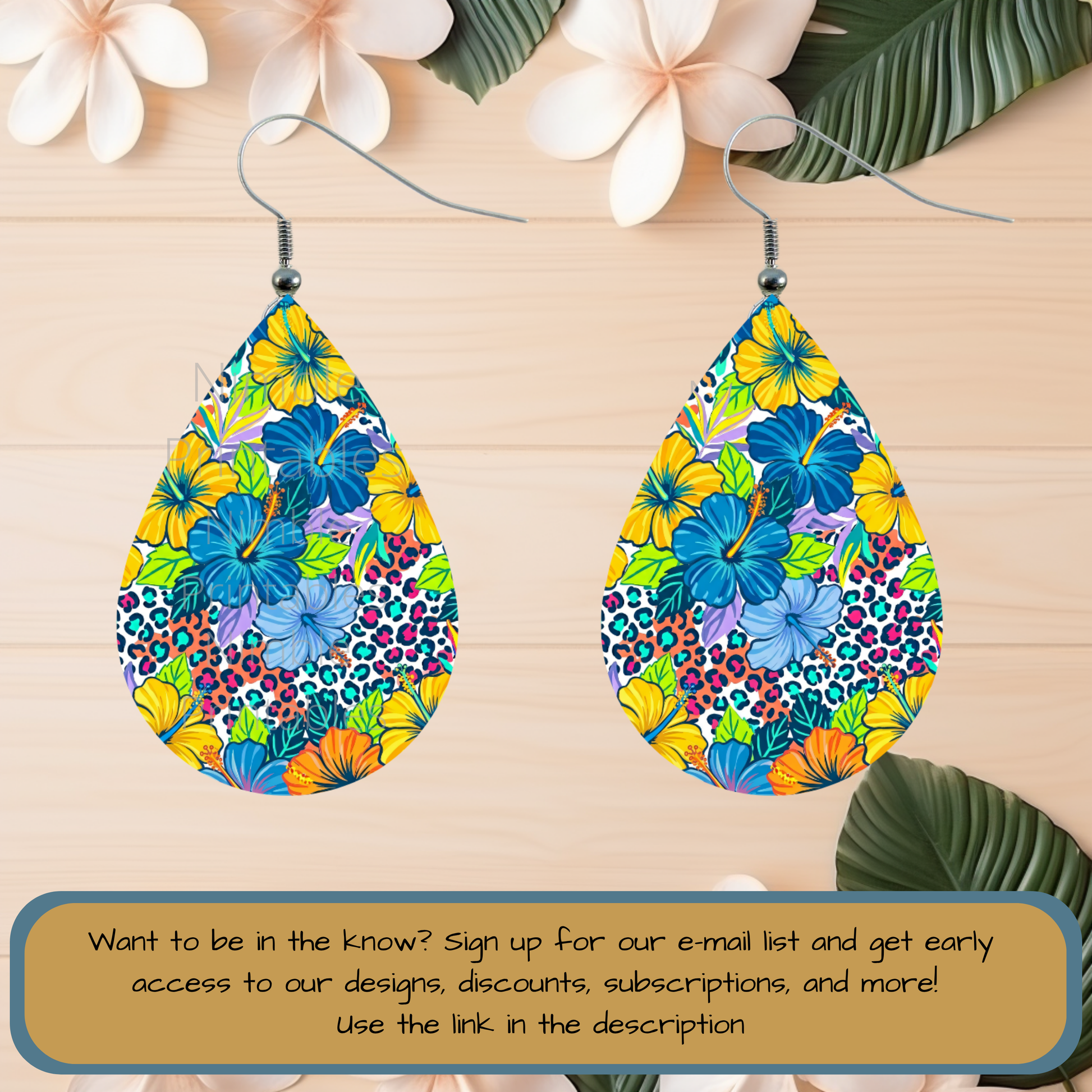 Teardrop earrings with floral and leopard print patterns.
