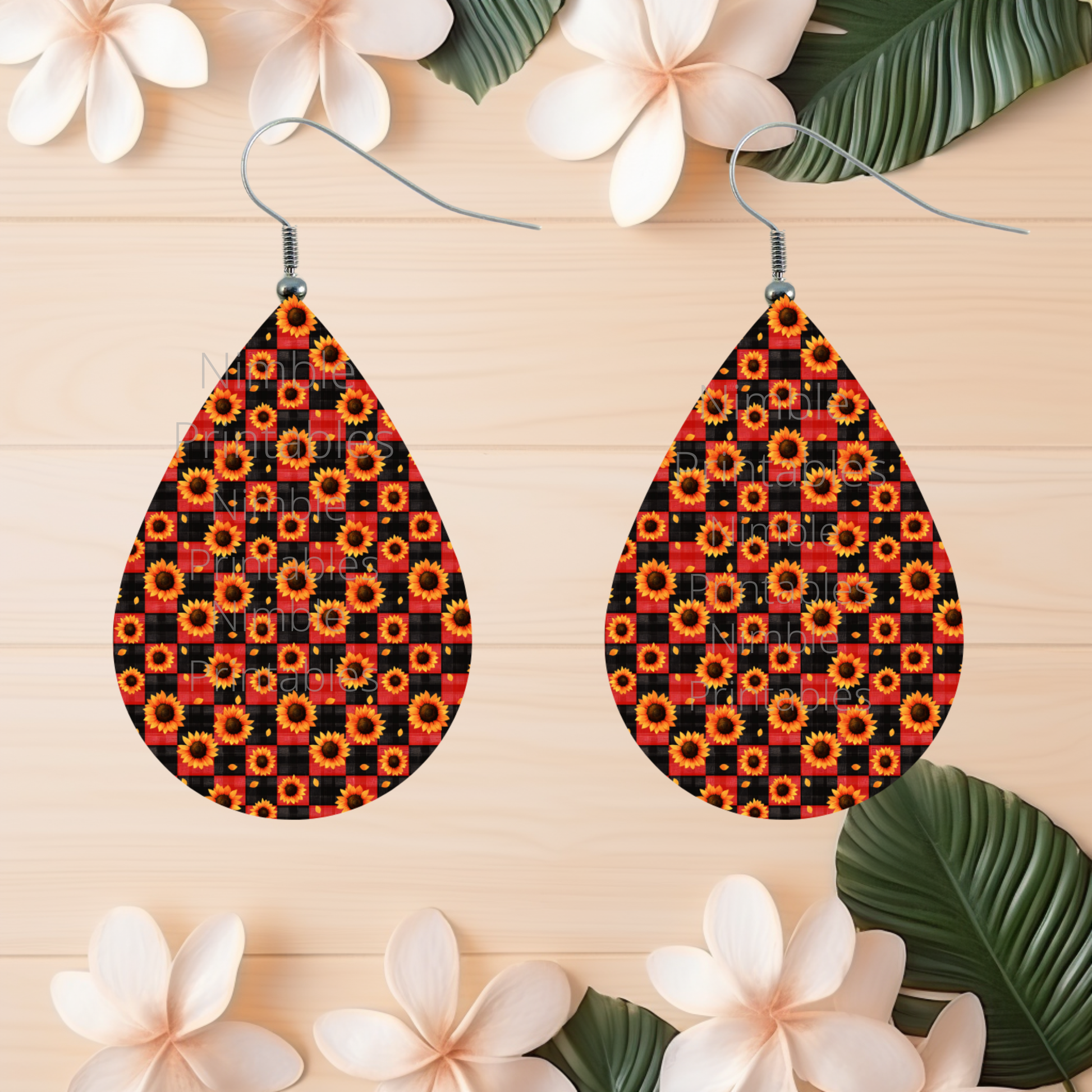 Teardrop earrings with sunflowers and red and black plaid pattern.