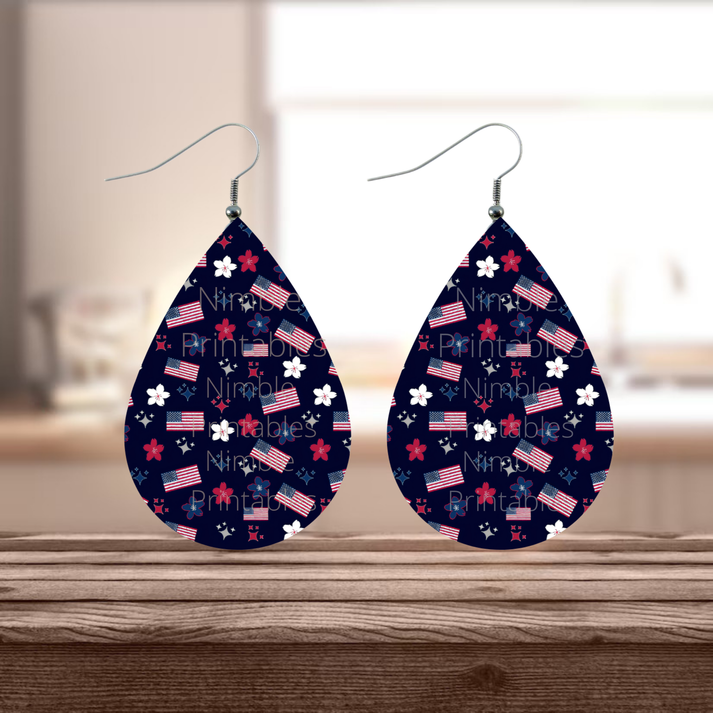 Teardrop earrings with American flag and floral pattern.