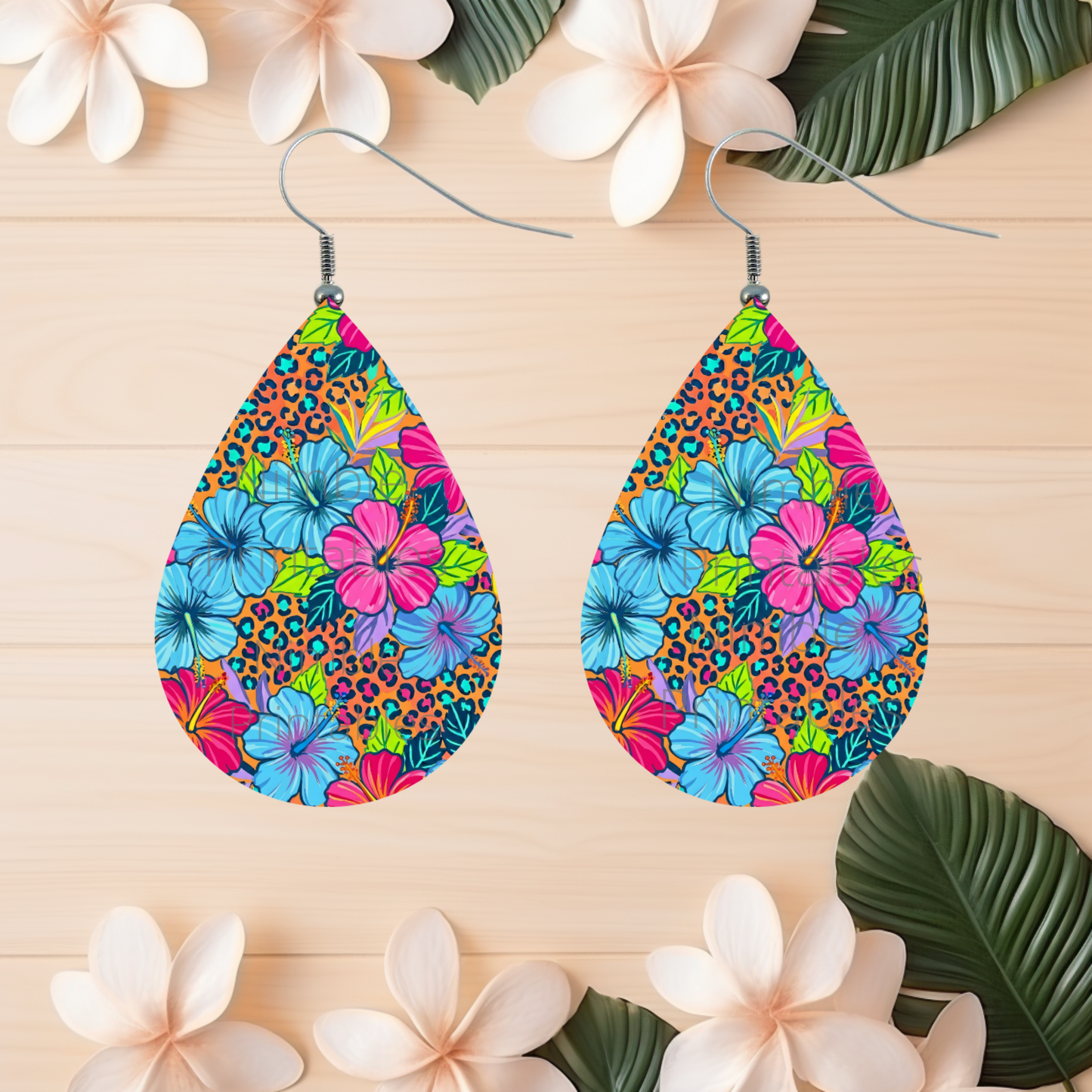 Teardrop earrings with tropical flowers and leopard print pattern.