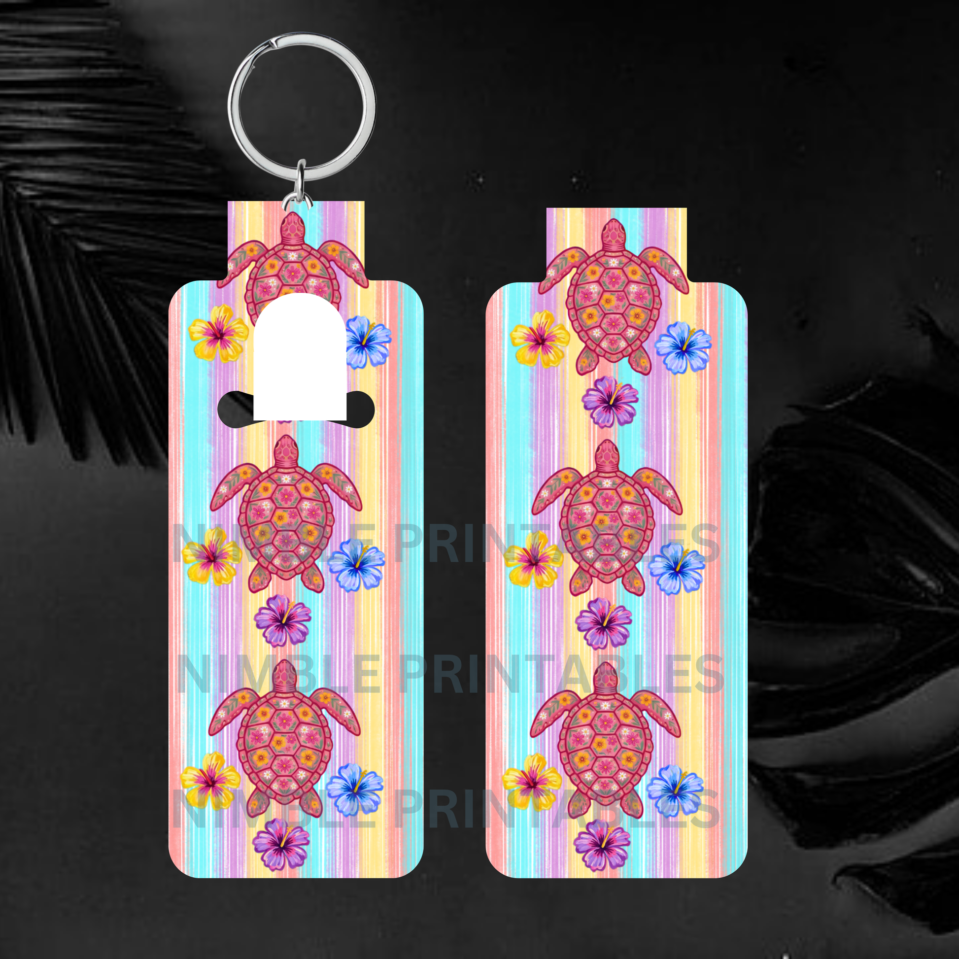 Two colorful keychains with turtles and flowers on a striped background.